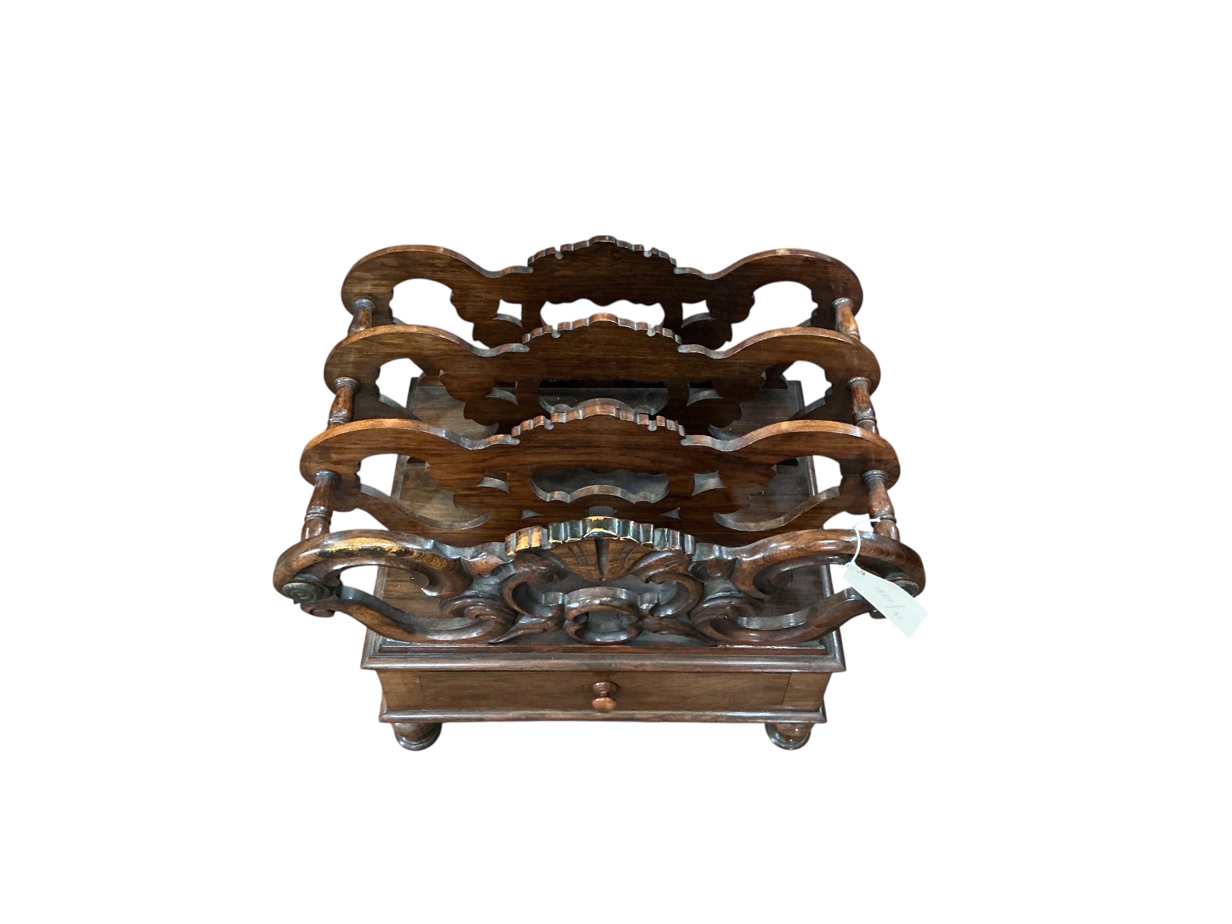 A Victorian rosewood three division Canterbury, width 54cm, depth 36cm, height 46cm